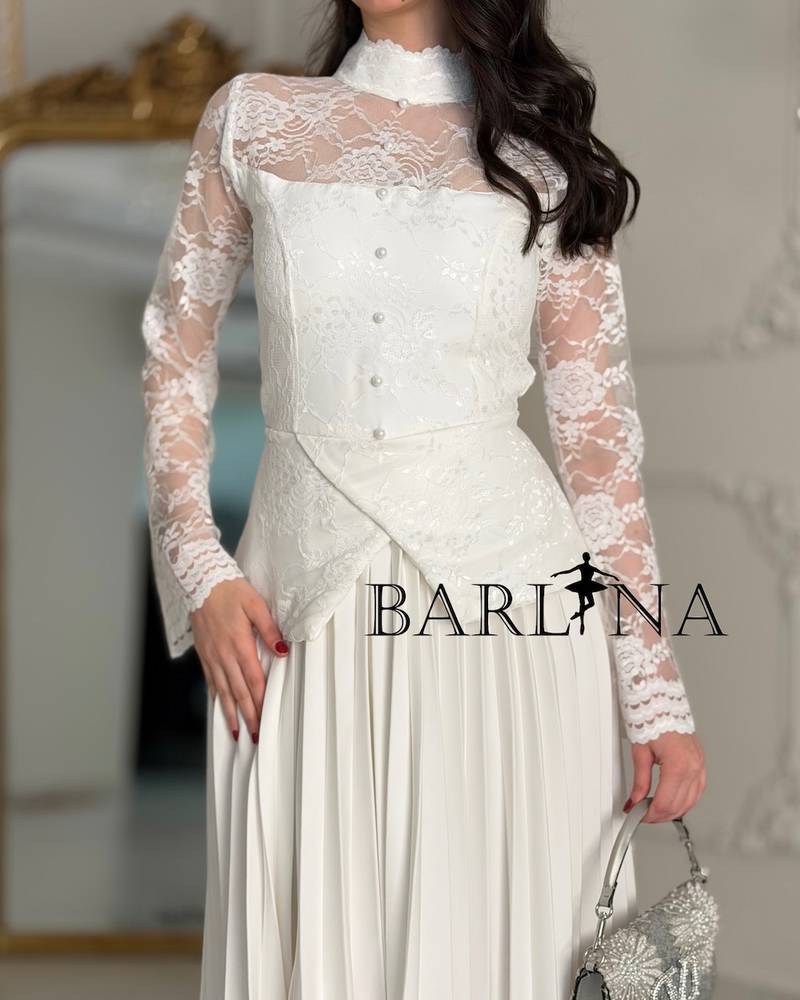 White dress with lace and soft pleats