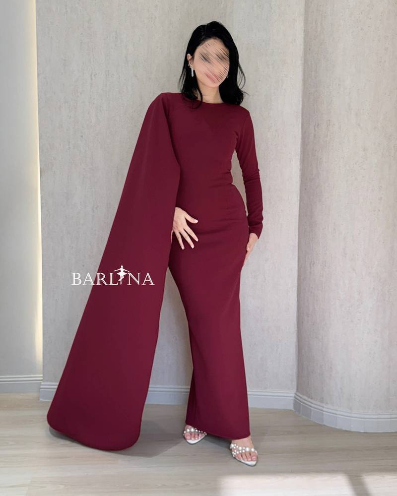 Burgundy dress with a simple design and long sleeves