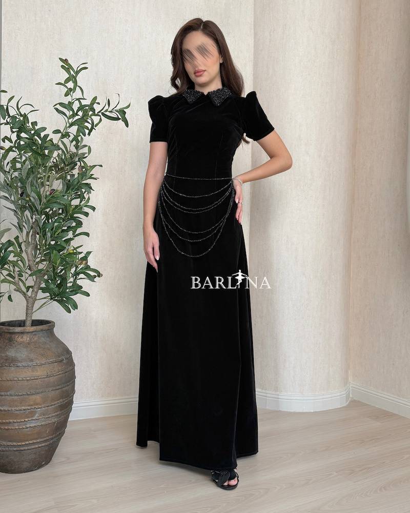 Black velvet dress with delicate chains