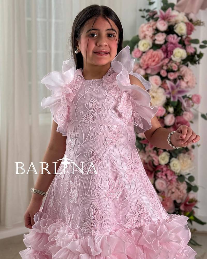 Girls' pink evening dress with a ruffled design