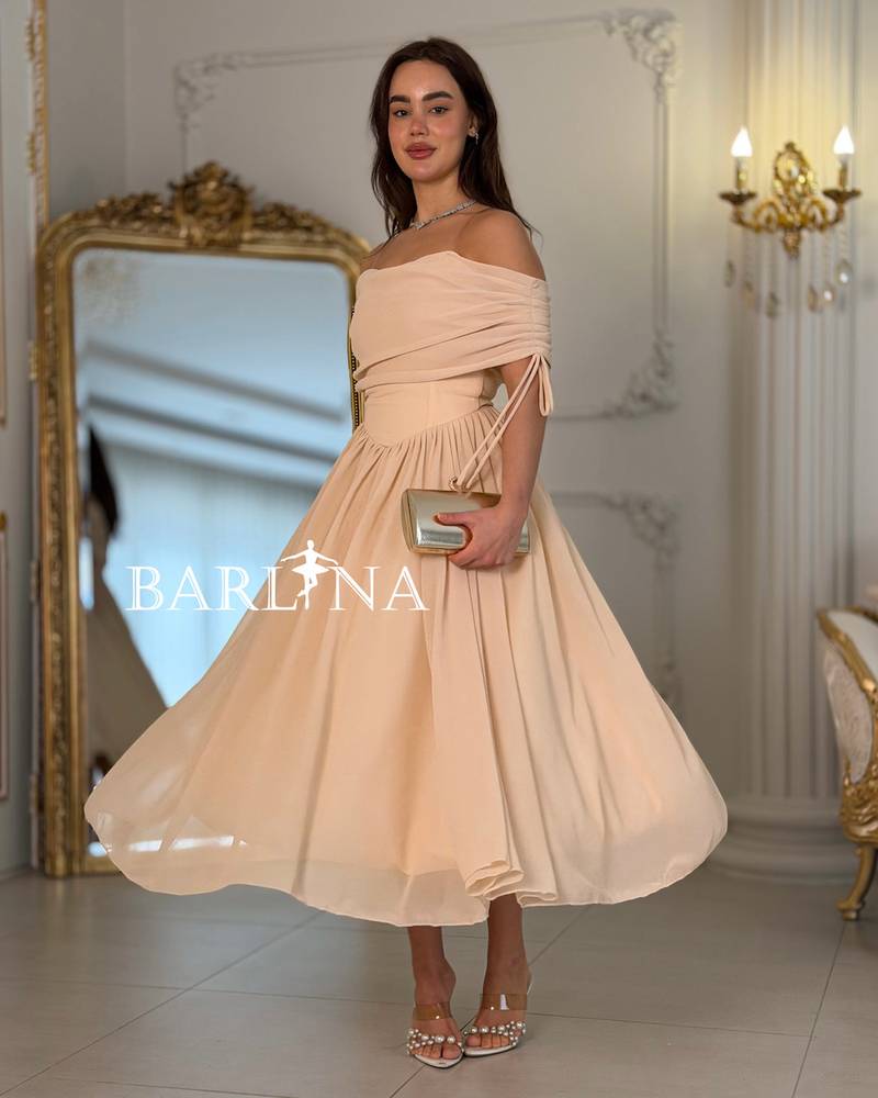 Beige midi dress with lightweight fabric and an elegant cut