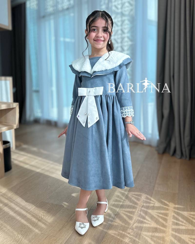 Girls' navy dress with white bow