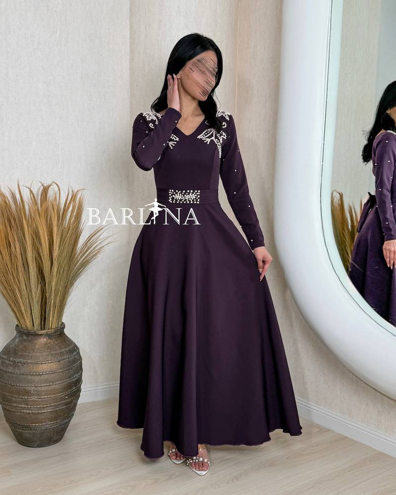 Purple dress with crystal embroidery on the chest