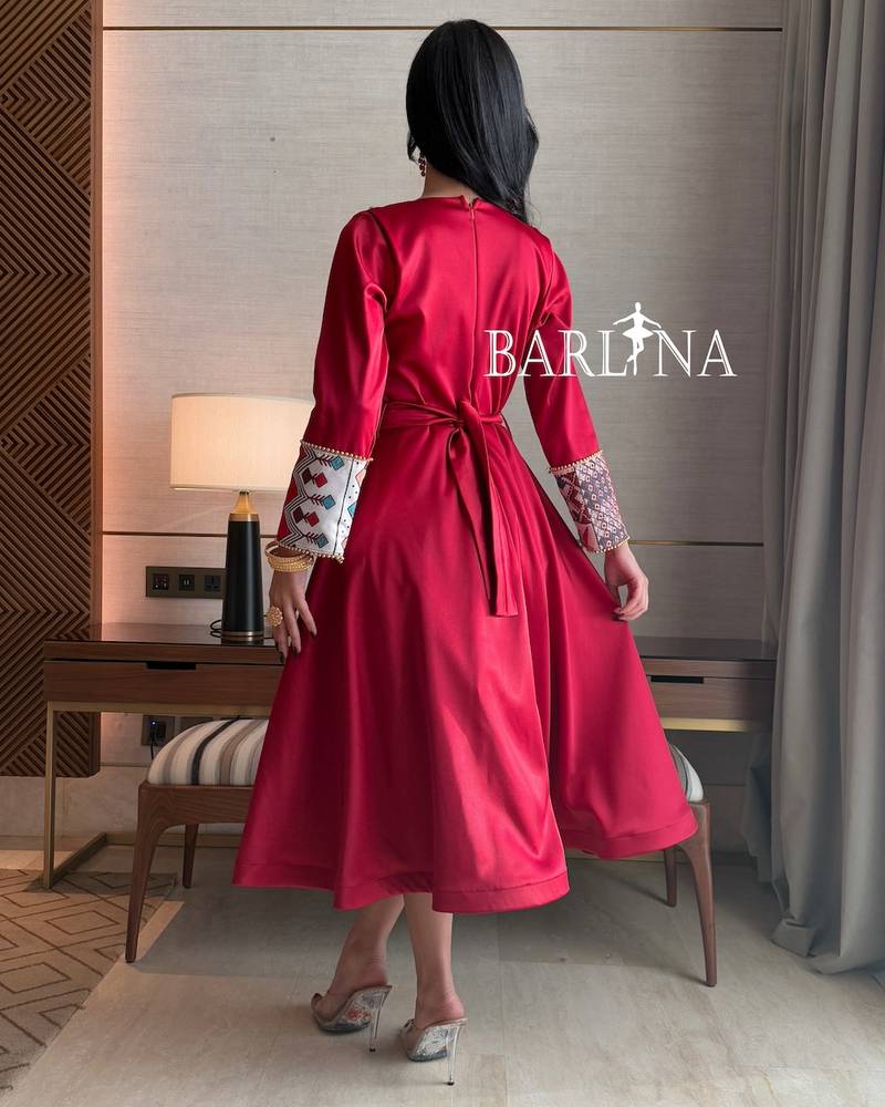 Red midi dress with traditional patterns