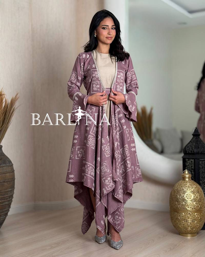 Purple jalabiya with patterns and a slanted hem