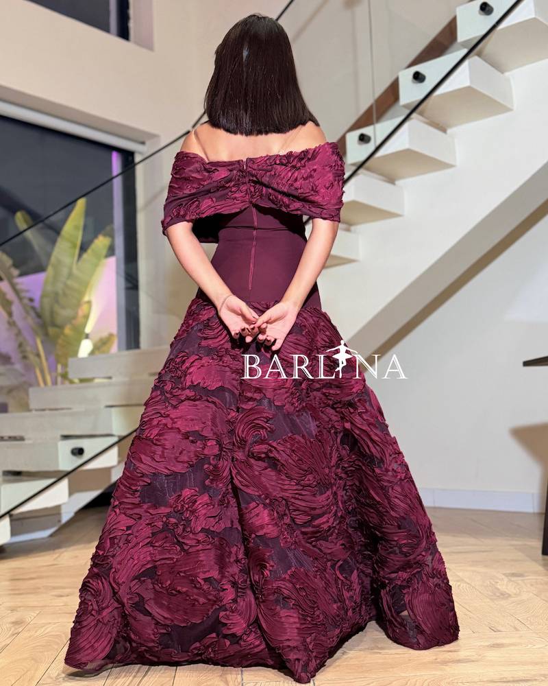 Burgundy dress with prominent embroidery and off-the-shoulder