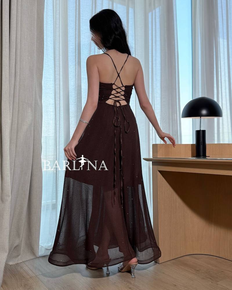 A dark brown sparkly dress with thin straps