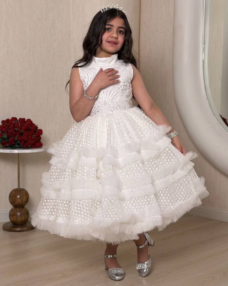 Royal white girl's dress with a wide design