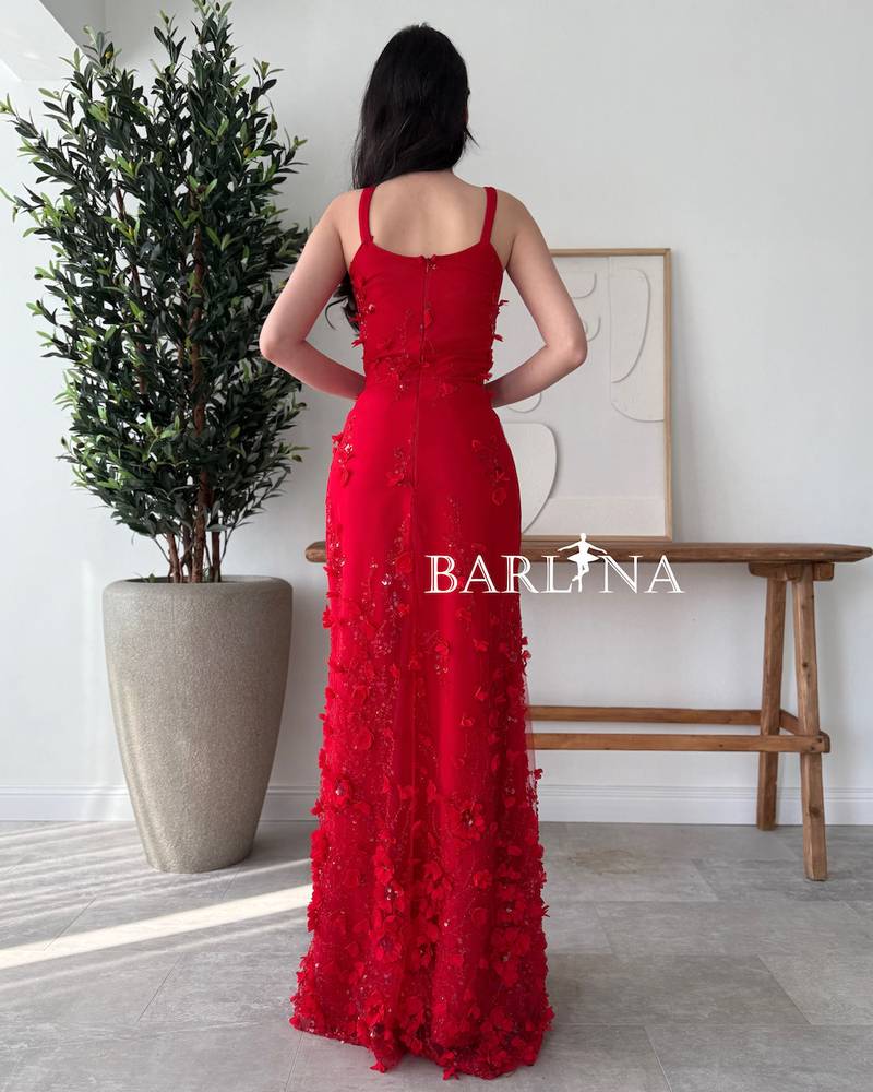 Long red dress embroidered with flowers
