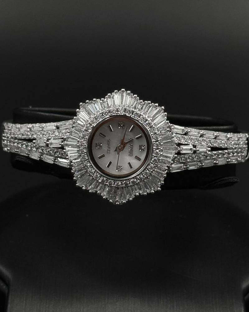 Uniquely designed watch studded with long stones