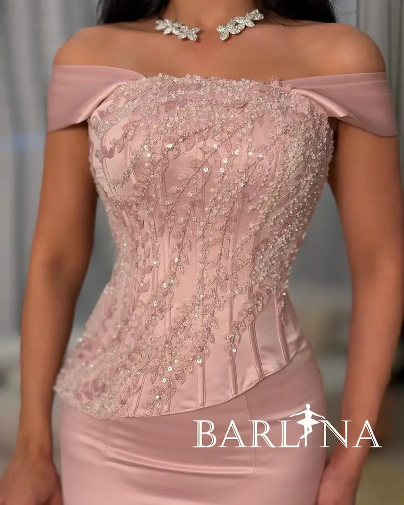 Pink off-shoulder evening dress with delicate embroidery