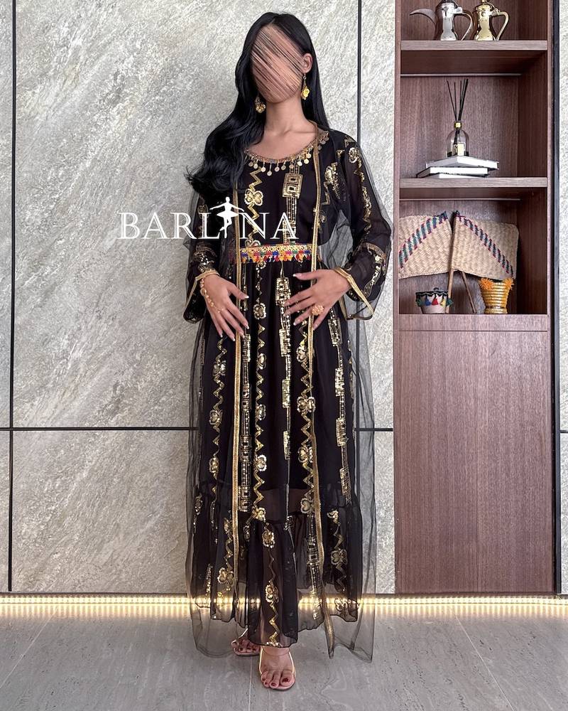 Black jalabiya with gold embroidery and transparent abaya