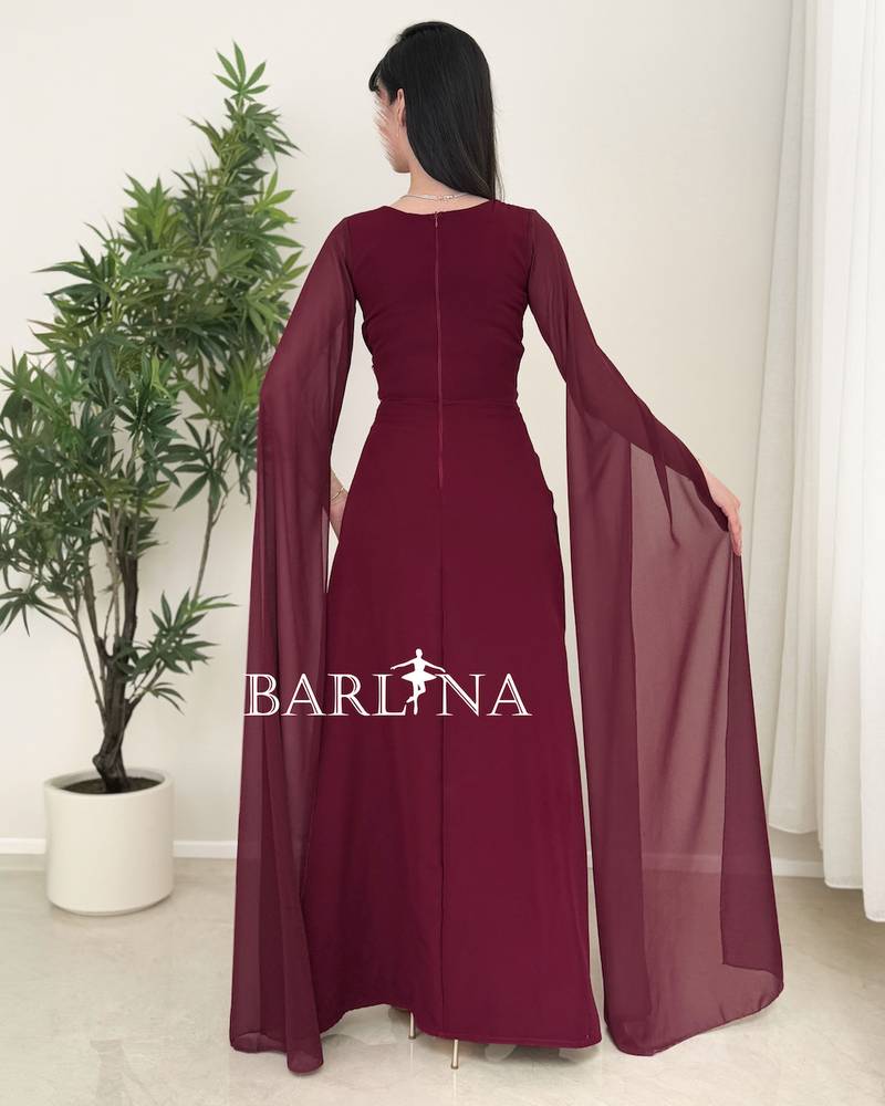 A soft burgundy dress with side embroidery details