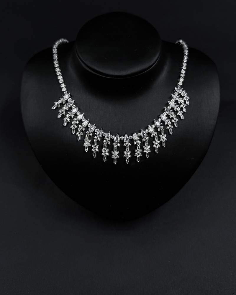 Elegant accessory set with dangling, studded details