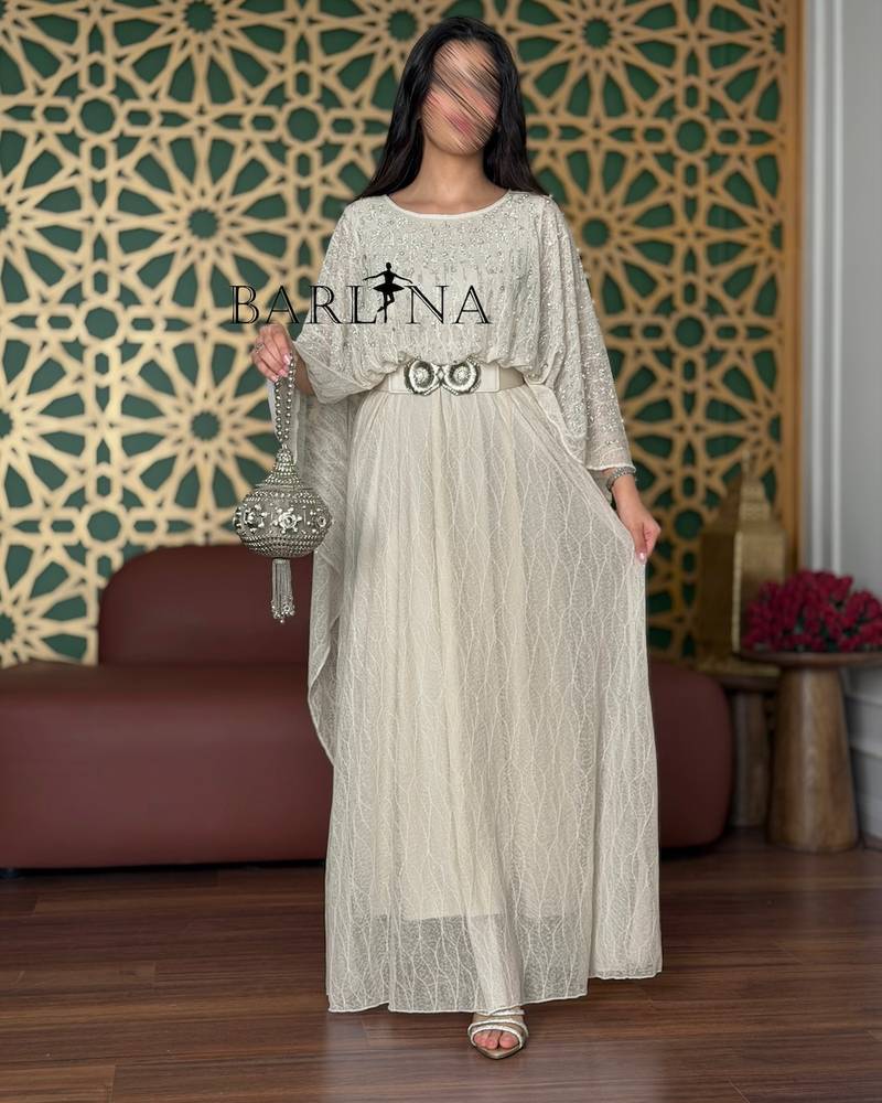 Off-white jalabiya with a wide belt and crystal embroidery