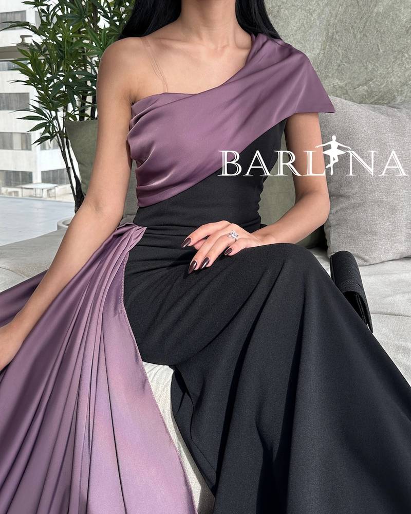 Black evening dress with shoulder and purple shawl