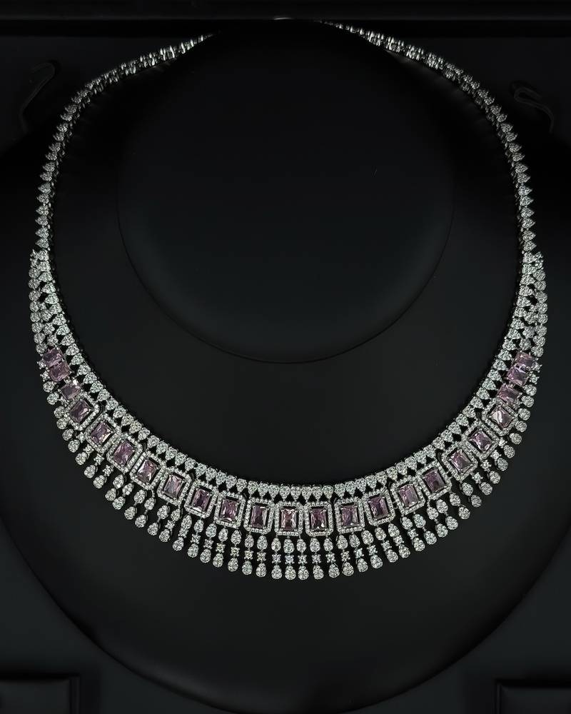 Evening accessory set studded with pink stones