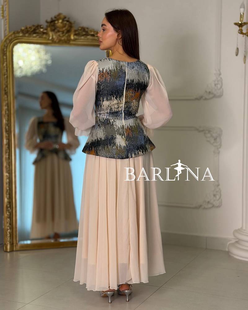 Beige dress with artistic patterns and sheer sleeves