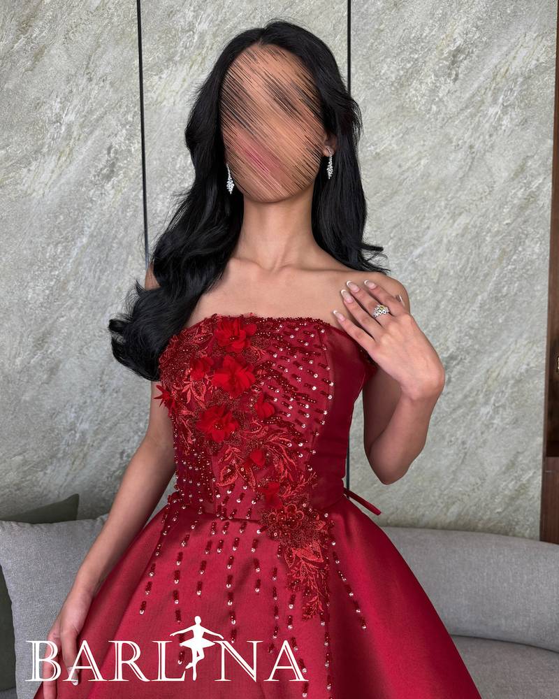 Royal red dress with luxurious embroidery on the chest