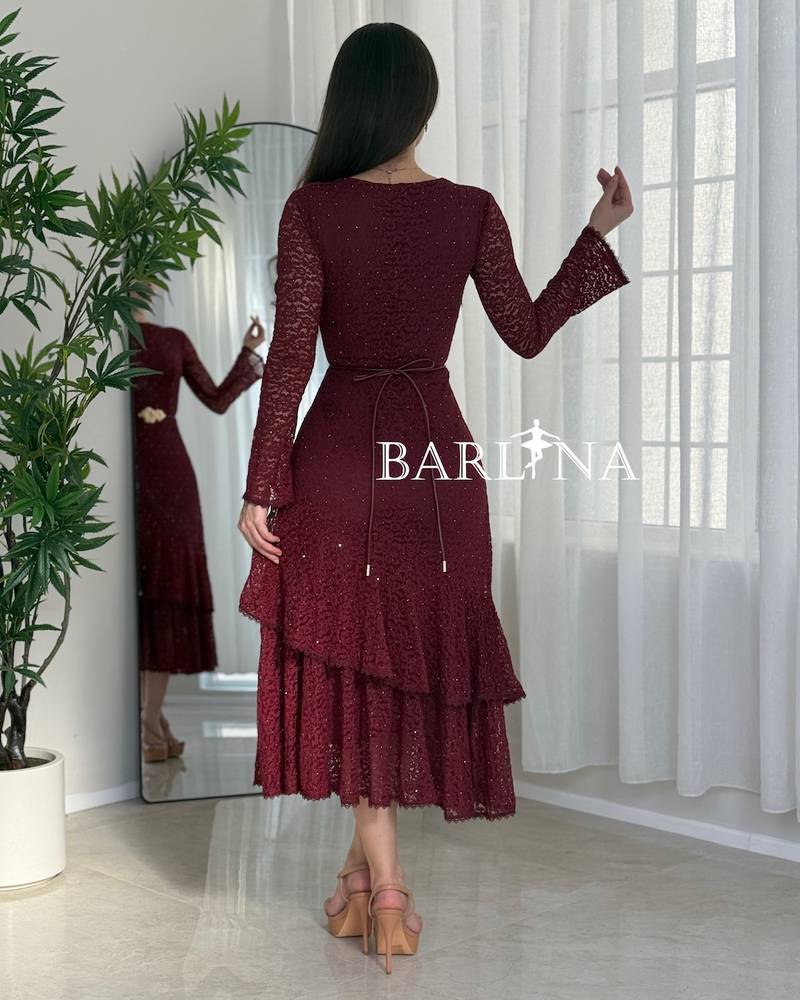 Feminine burgundy lace dress with a gold belt