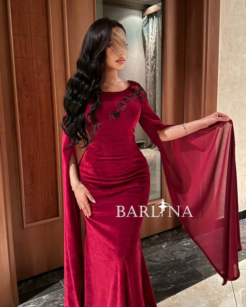 Burgundy velvet dress with roses on the shoulder