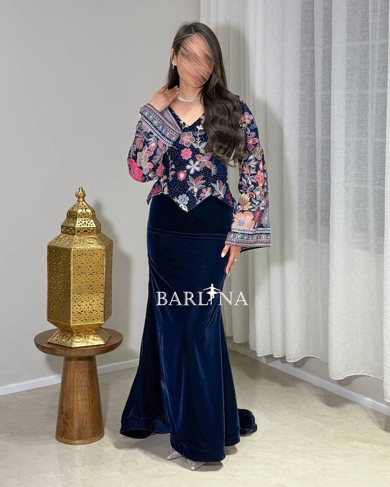 navy velvet jalabiya with an embroidered floral bodice