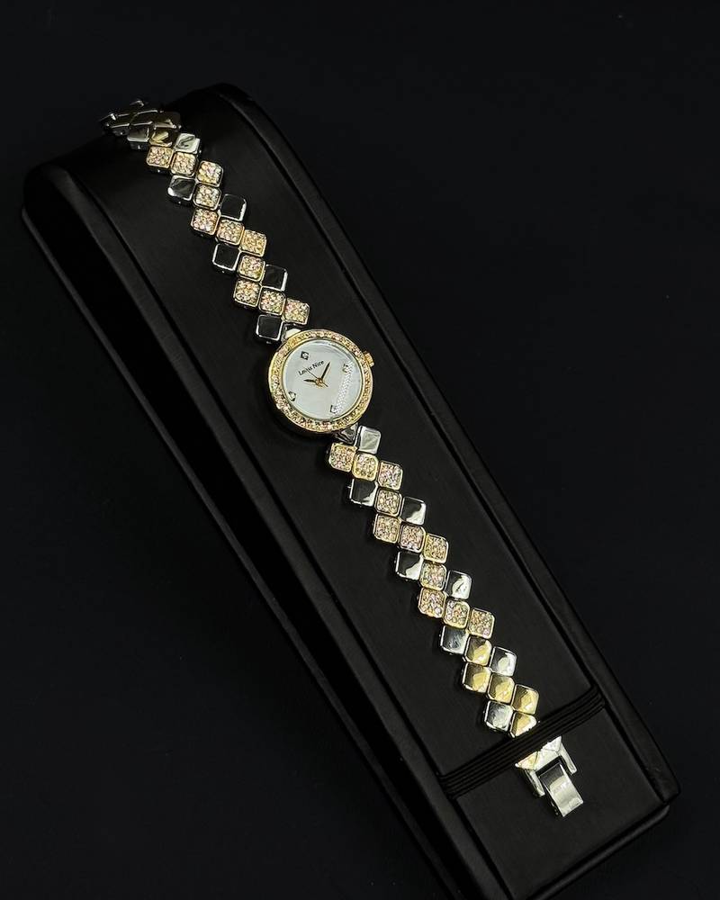 A women's watch with elegant, shimmering details.