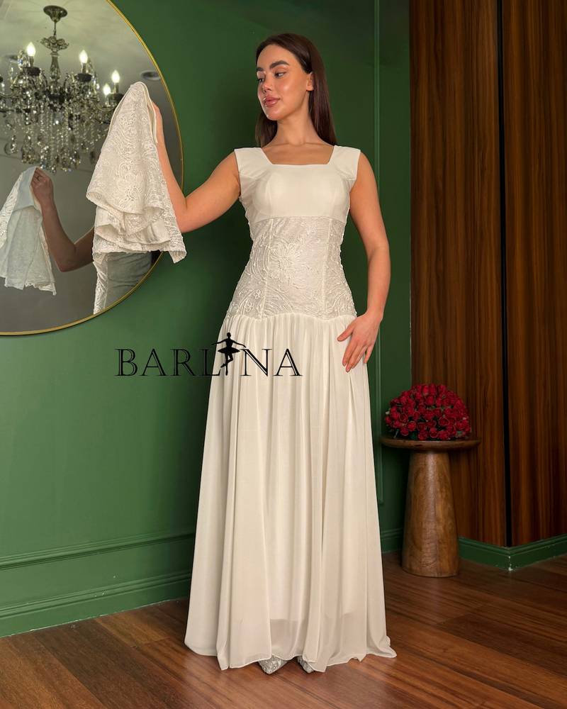 Long white dress with delicate lace