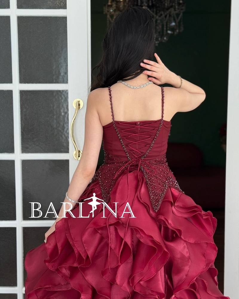 Burgundy evening dress with multiple ruffle layers