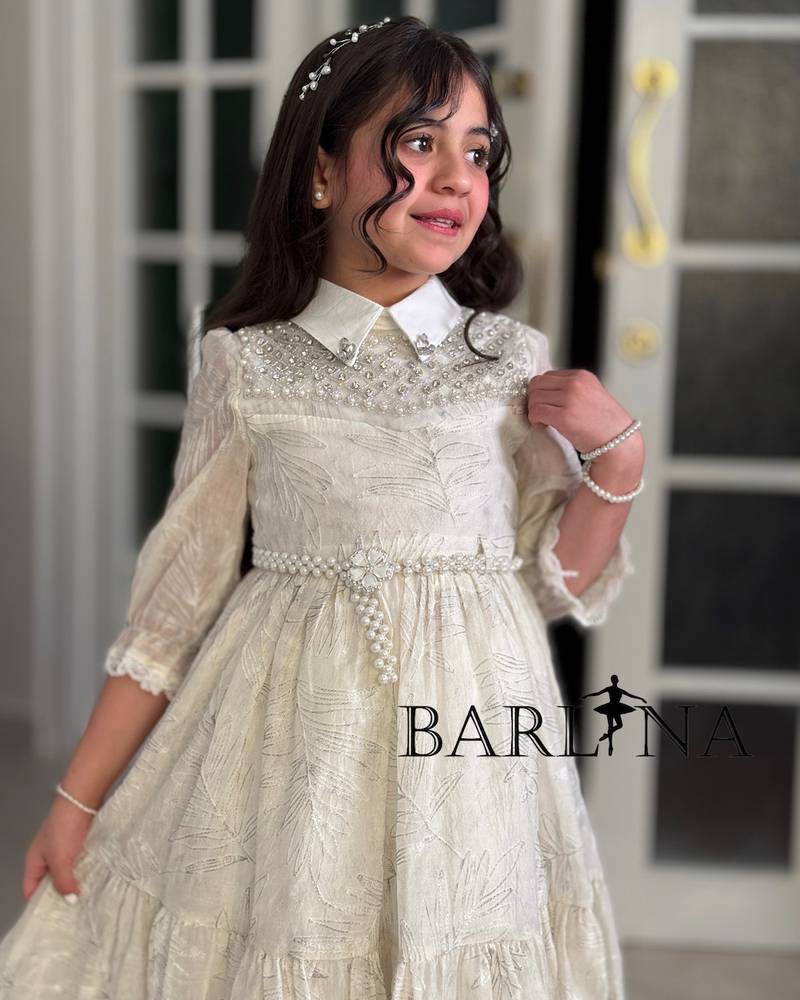 Elegant girls' dress with a puffy cut