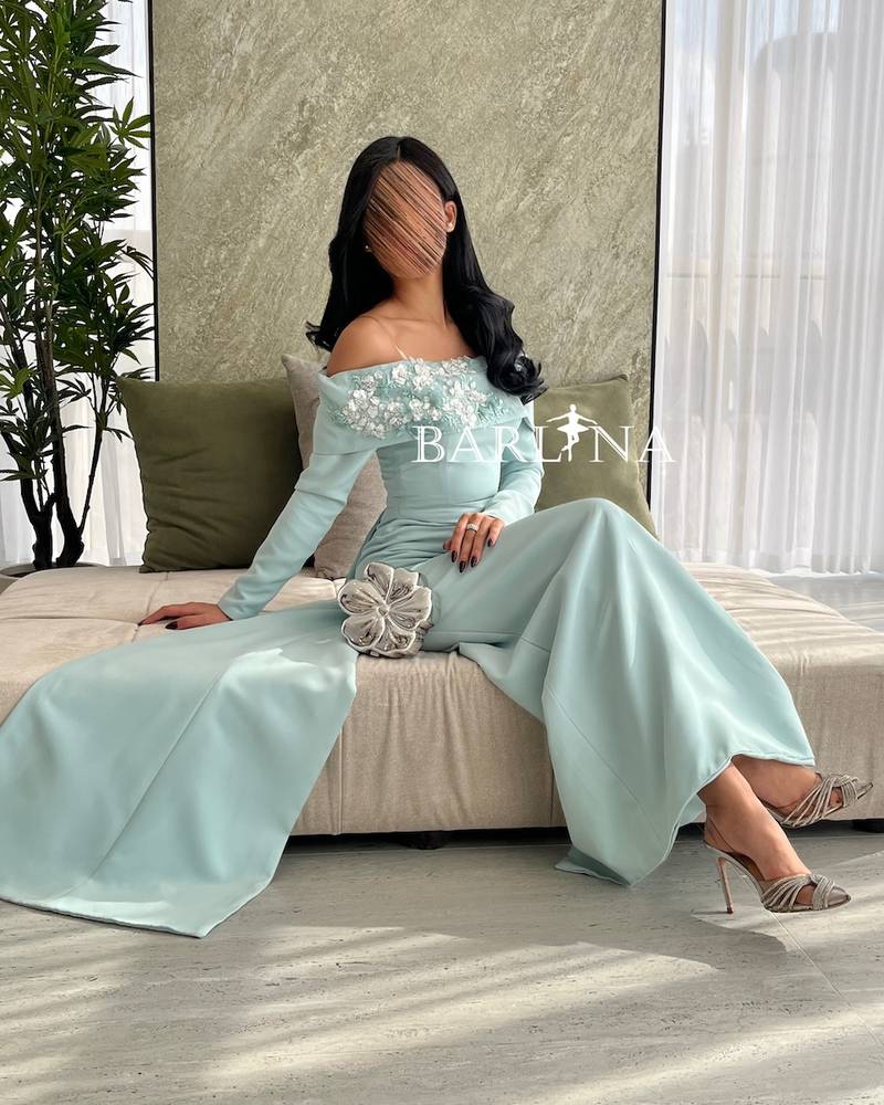 Light Tiffany dress with floral detail on the chest