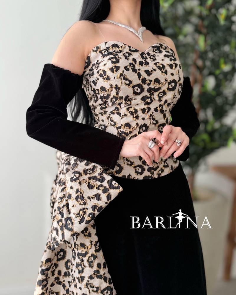 Black velvet dress with jacquard fabric embellishment