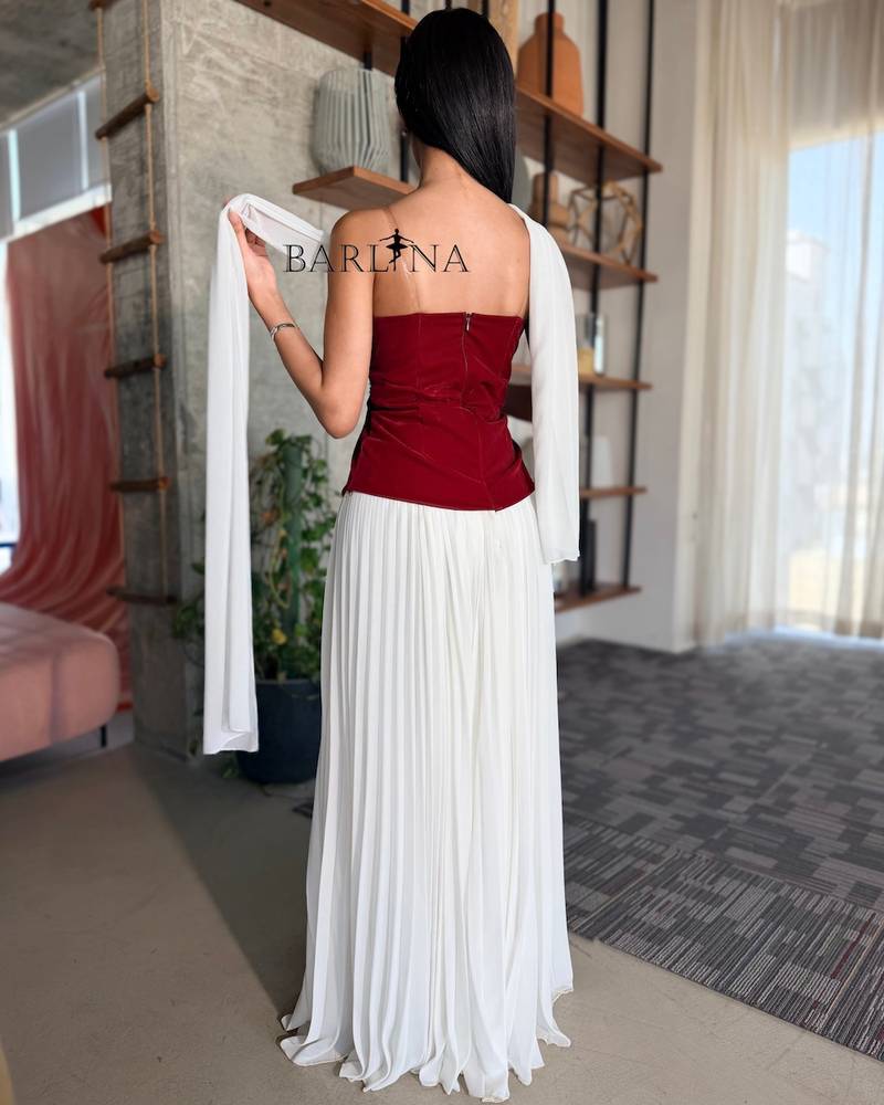 White pleated dress with a velvet bodice