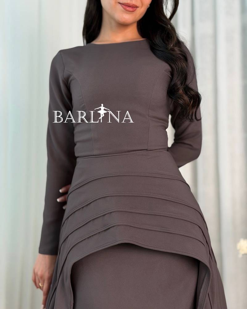 Elegant dress with a modest design and long sleeves