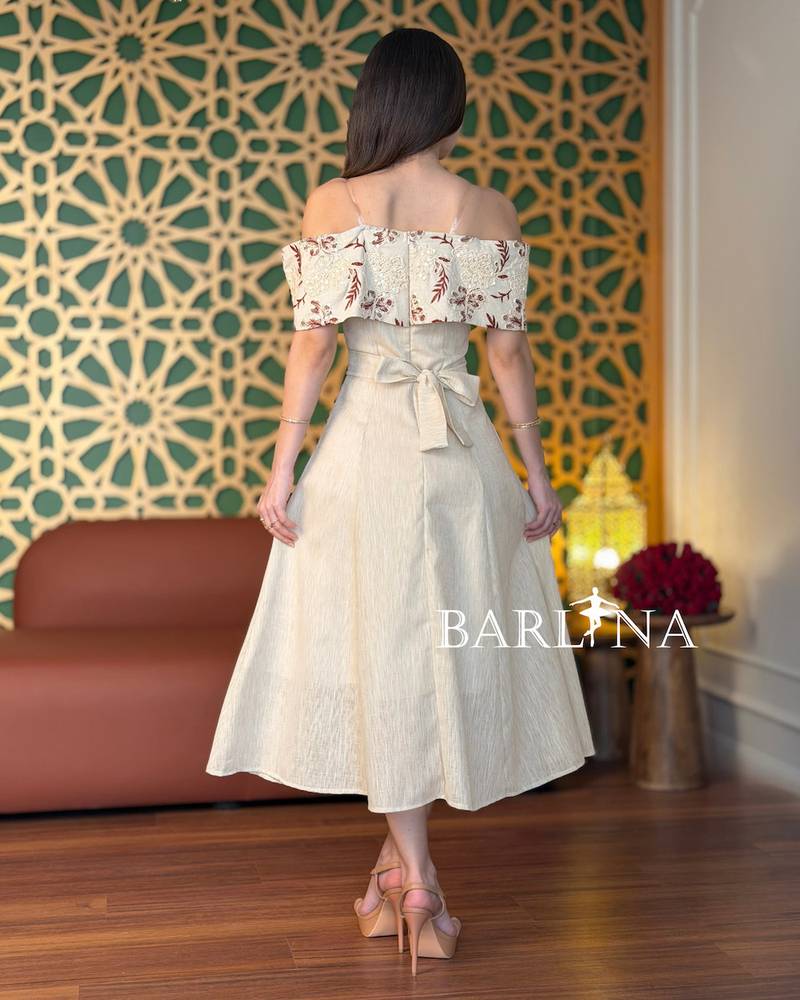 Beige off-shoulder dress with delicate embroidery