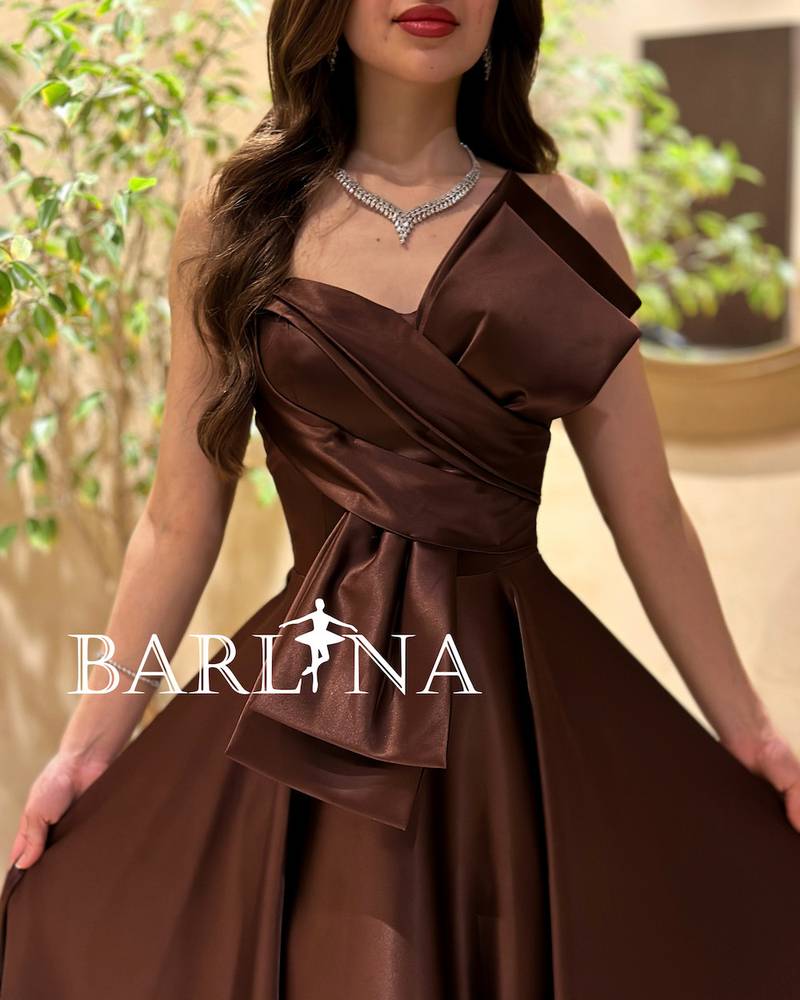 Shiny brown dress with elegant front bow