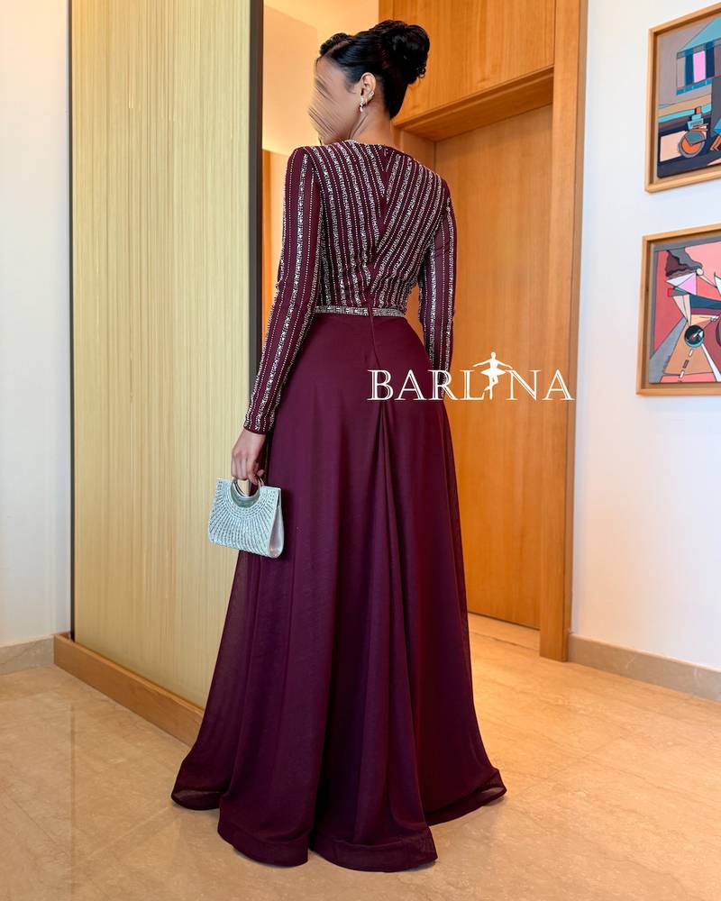 Elegant burgundy dress with shimmering silver embroidery