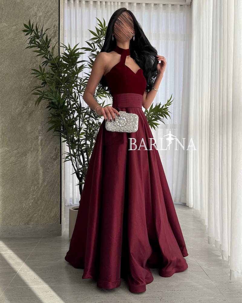 Luxury burgundy dress with a distinctive neckline