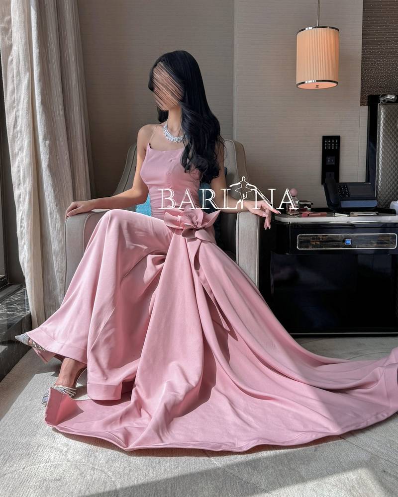 Long pink evening dress with a wide bottom