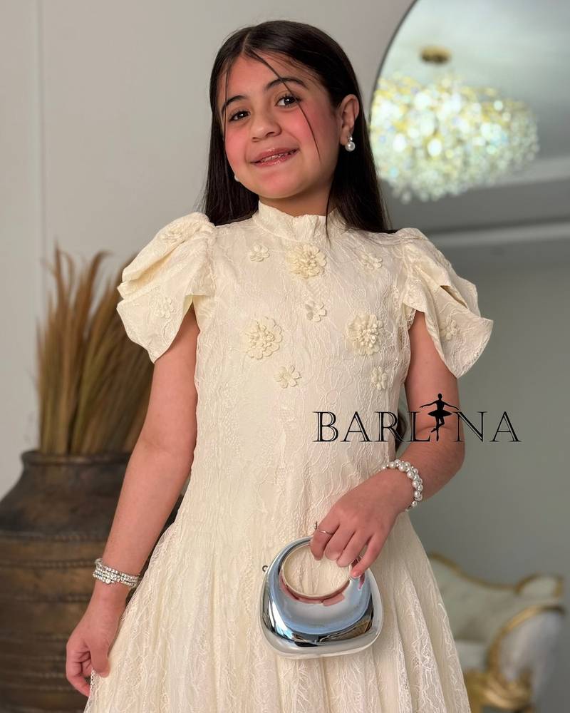 A soft girls’ lace dress with a feminine design