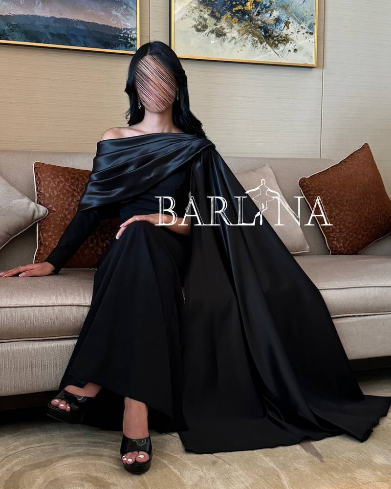 Soft black evening dress with one sleeve
