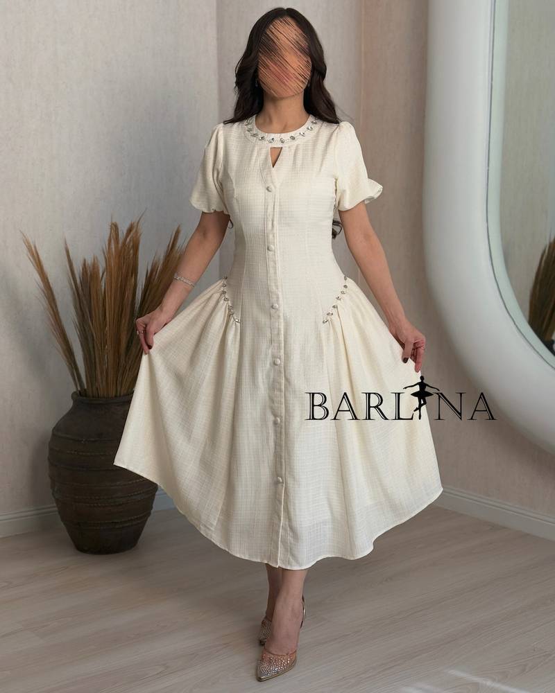 Soft off-white dress with front buttons
