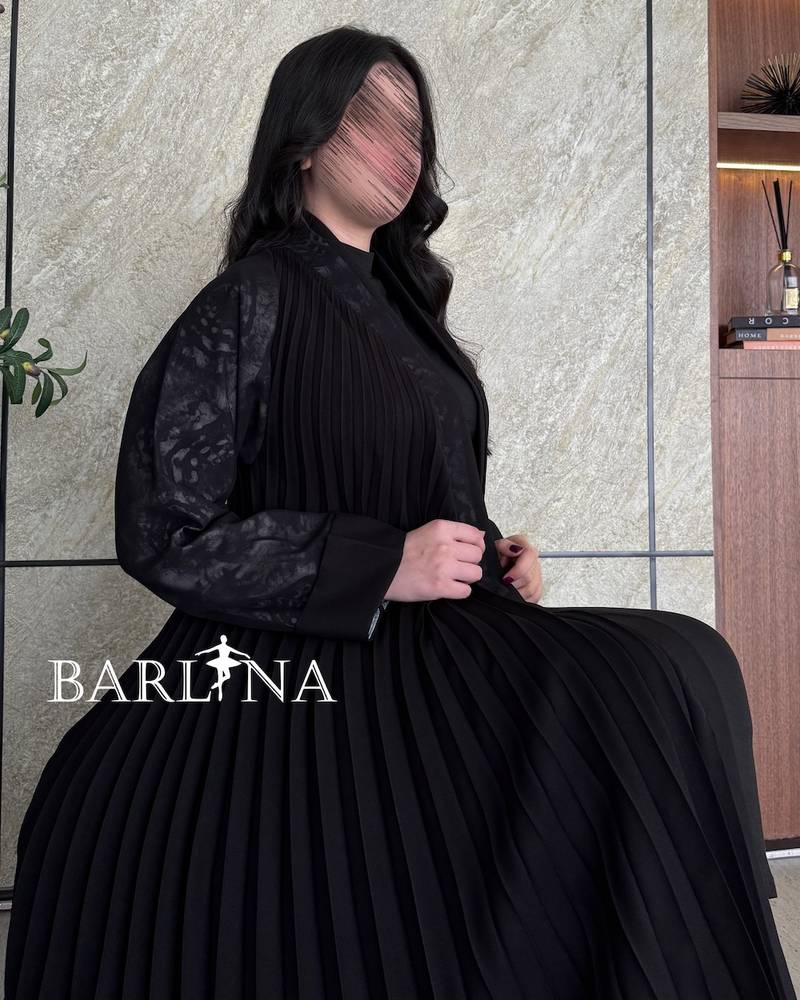 Luxurious black abaya with soft pleats throughout