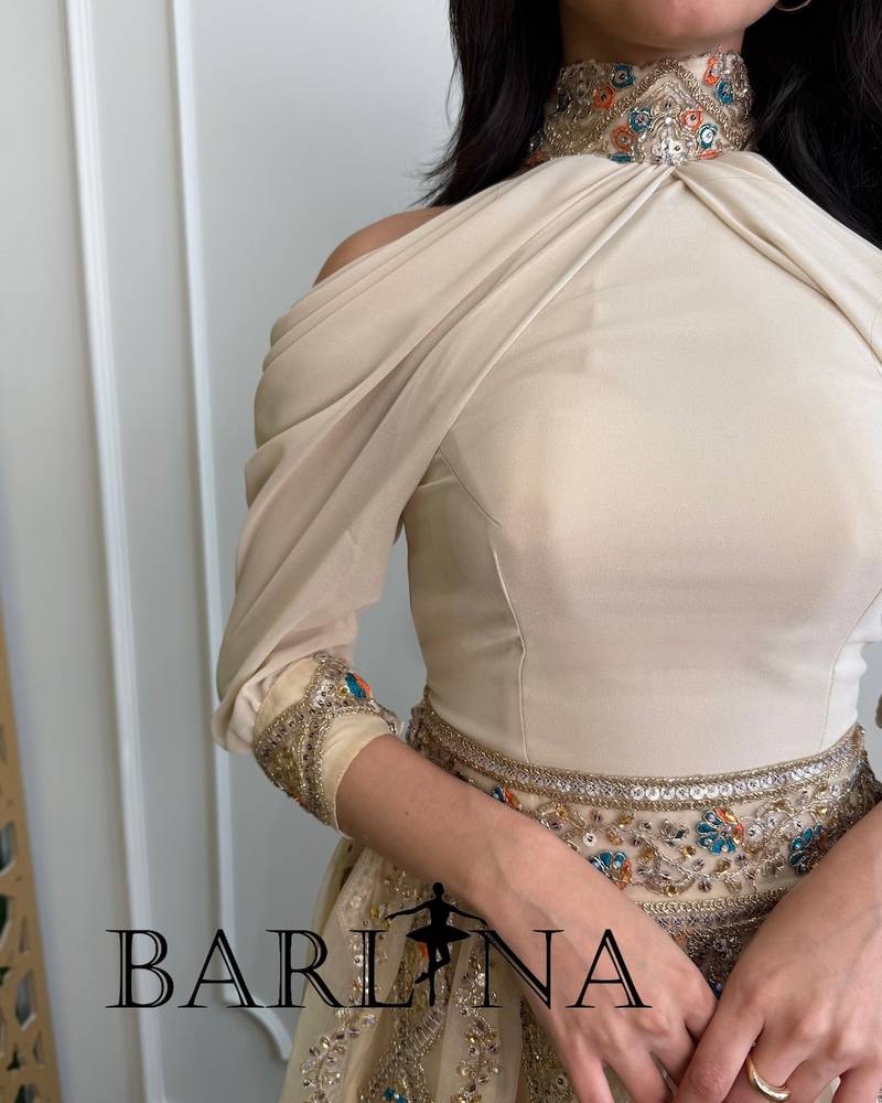 Luxurious beige jalabiya with long flowing sleeves