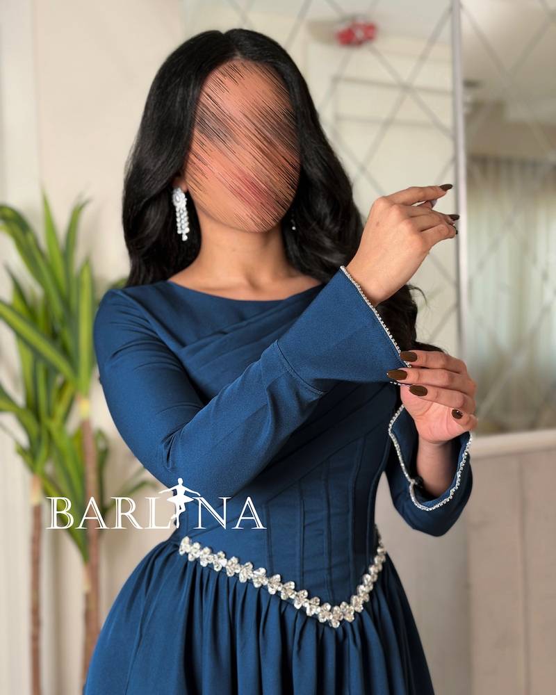 Long-sleeved petroleum-colored dress