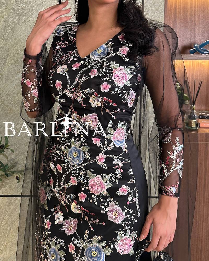 Black evening dress with shiny floral embroidery