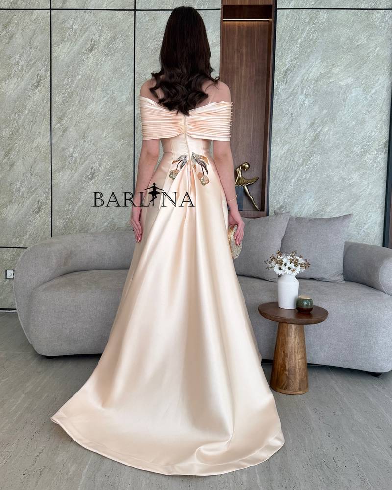 Beige evening dress with hanging floral embroidery
