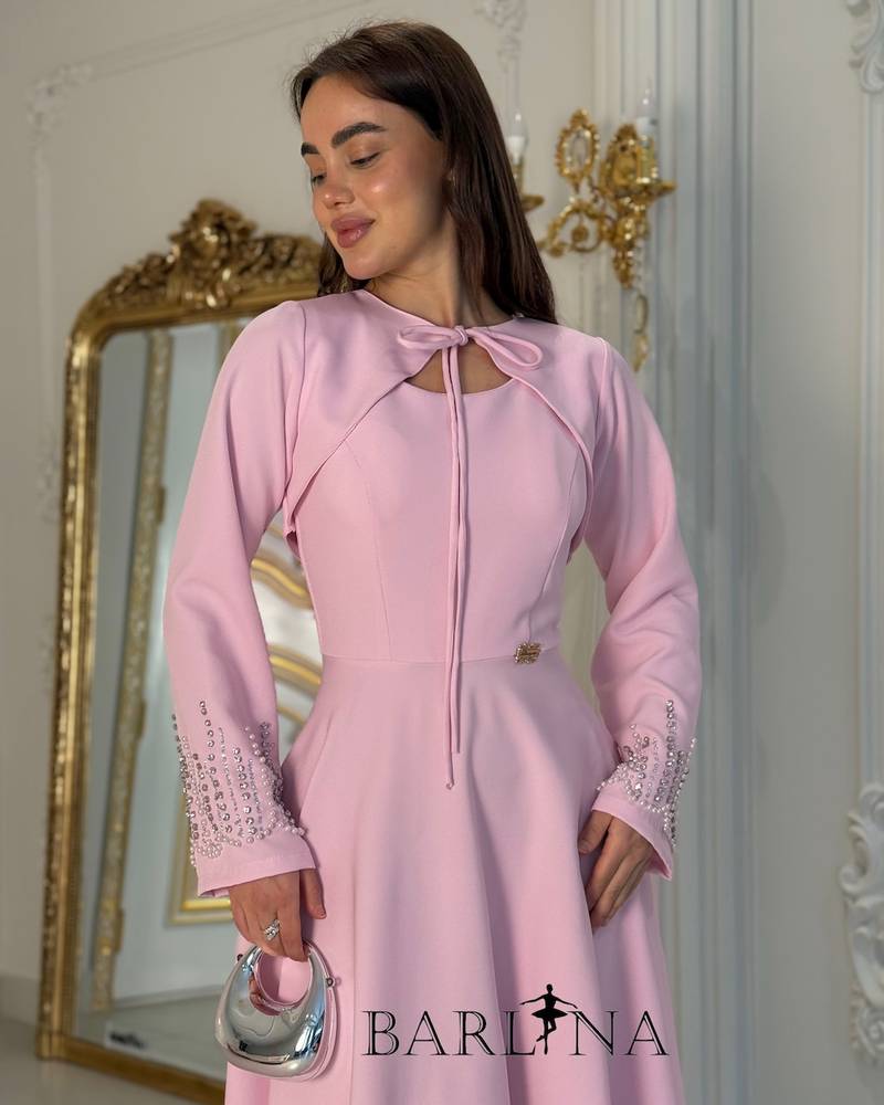 Pink dress with a jacket decorated with crystals and pearls