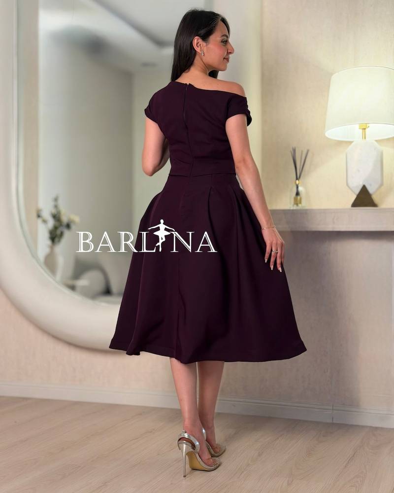 Dark purple dress with crystal embellishments