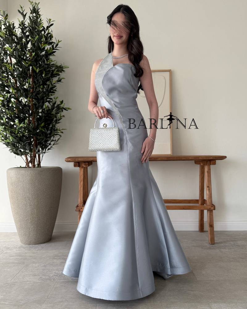 Gray dress with a sparkling diamond detail on the front